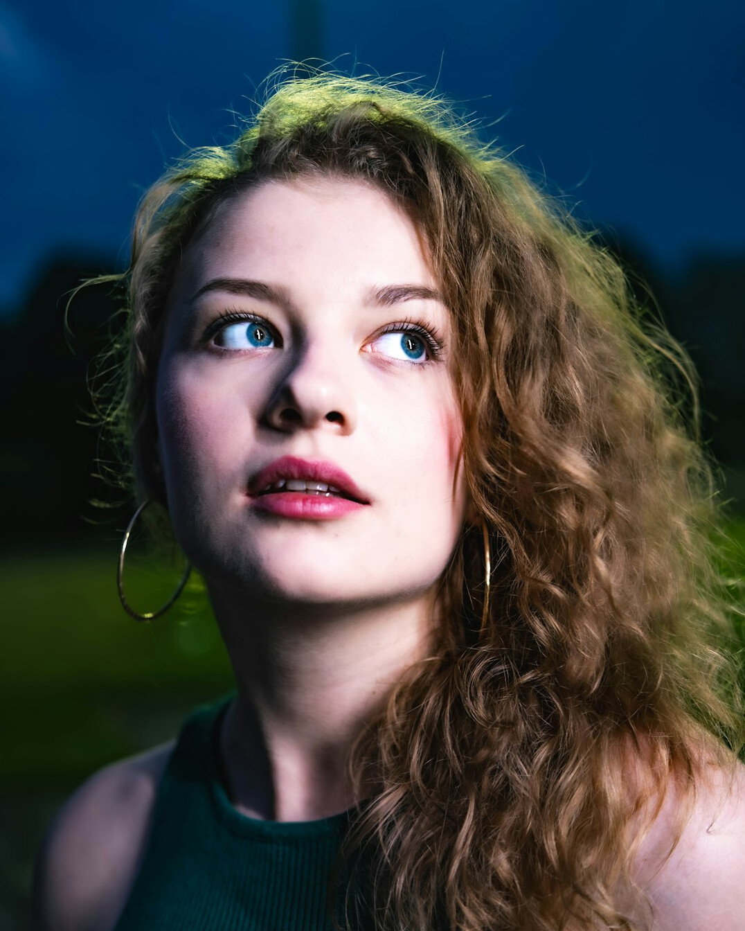 Portrait of a woman with curly hair
