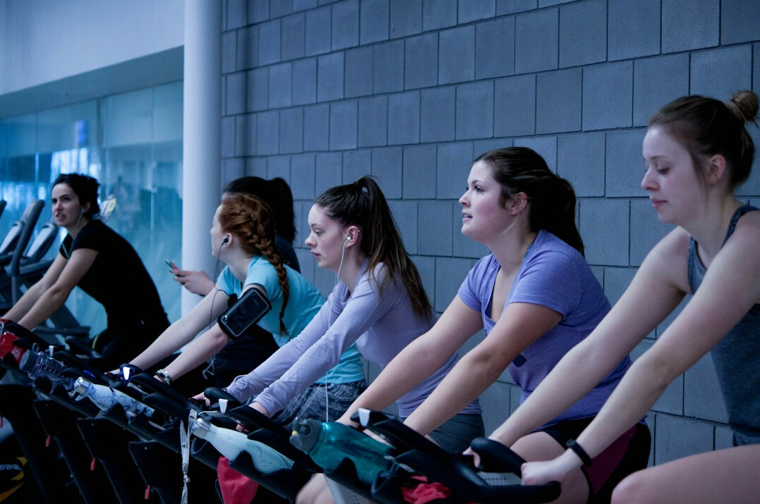 Group fitness class in a bright studio