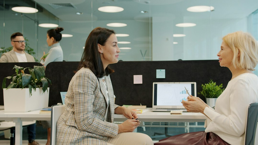office workers discussing stress